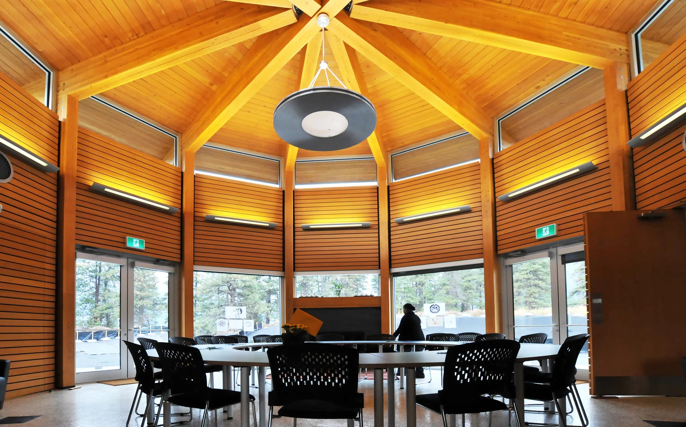 The community health room, its radiating timber ceiling and clerestory windows recalling the form of a pithouse.